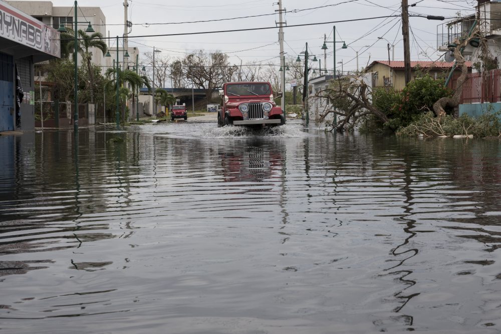 Streets in the Guaynabo suburb are flooded after Hurricane Maria made landfall, Sept. 21, 2017, in San Juan, Puerto Rico. The majority of the island has lost power, in San Juan many have been left without running water or cellphone service. (Alex Wroblewski/Getty Images)
