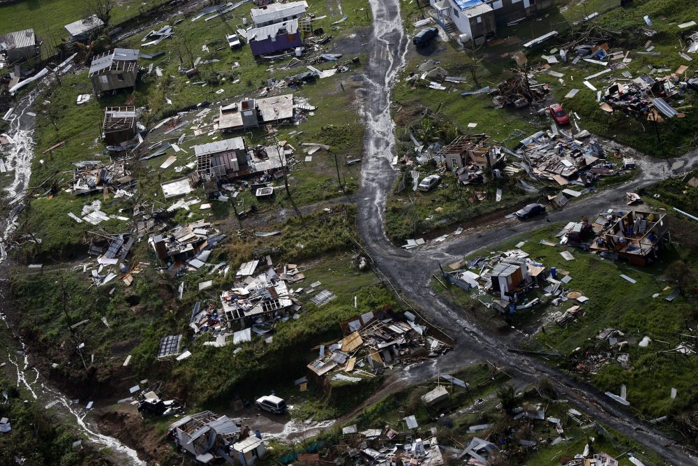 Destroyed communities are seen in the aftermath of Hurricane Maria in Toa Alta, Puerto Rico on Thursday, Sept. 28. (Gerald Herbert/AP)