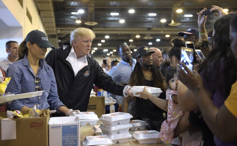 President Donald Trump and Melania Trump meet people impacted by Hurricane Harvey during a visit to the NRG Center in Houston, Saturday, Sept. 2, 2017. (Susan Walsh/AP)