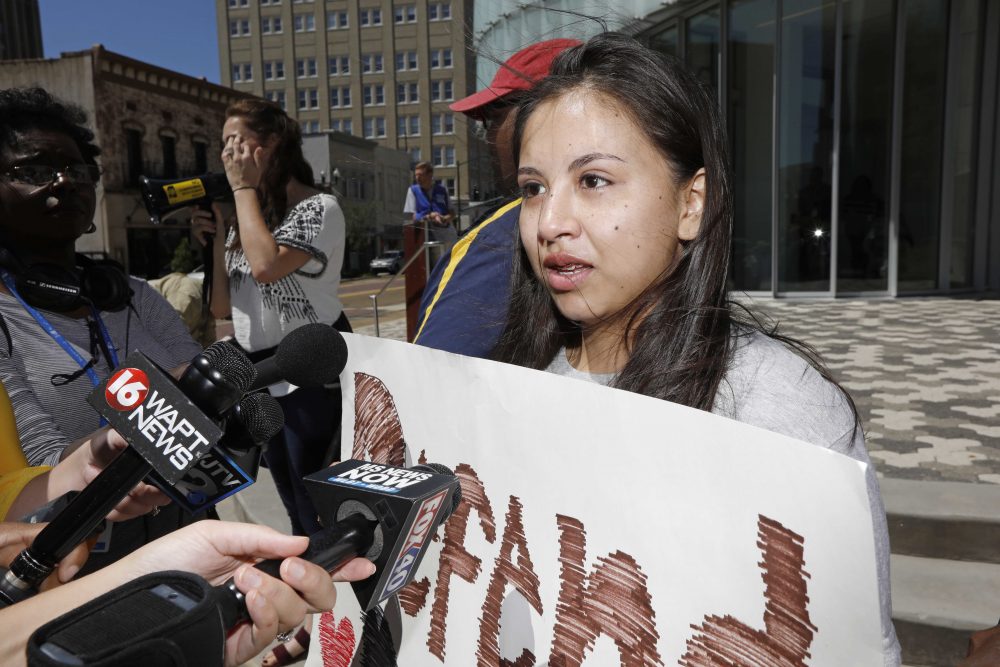 Brenda Ramirez, 18, speaks to reporters about the opportunities she receives via the DACA program during a protest at the federal building in downtown Jackson, Miss., Friday, Sept. 8, 2017. A group of human rights advocates, DACA recipients, immigrants and members of the Mississippi Immigrants' Rights Alliance, called for Mississippi's senators, Roger Wicker and Thad Cochran, both Republicans, to help protect DACA recipients and pass a DREAM act. The group then marched to the Governor's Mansion and made the same plea. (Rogelio V. Solis/AP)