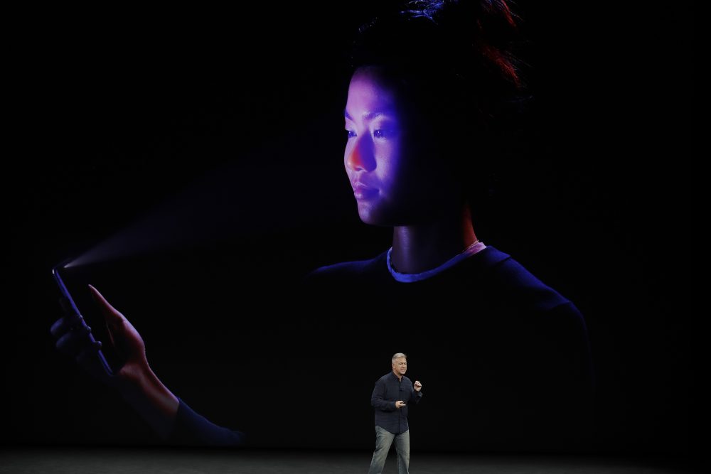 Phil Schiller, Apple's senior vice president of worldwide marketing, announces features of the new iPhone X at the Steve Jobs Theater on the new Apple campus on Tuesday, Sept. 12, 2017, in Cupertino, Calif. (Marcio Jose Sanchez/AP)