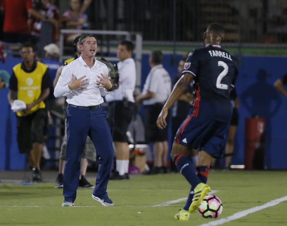 New England Revolution coach Jay Heaps signals to defender Andrew Farrell during the first half of the U.S. Open Cup soccer final against FC Dallas in 2016. (Tony Gutierrez/AP)