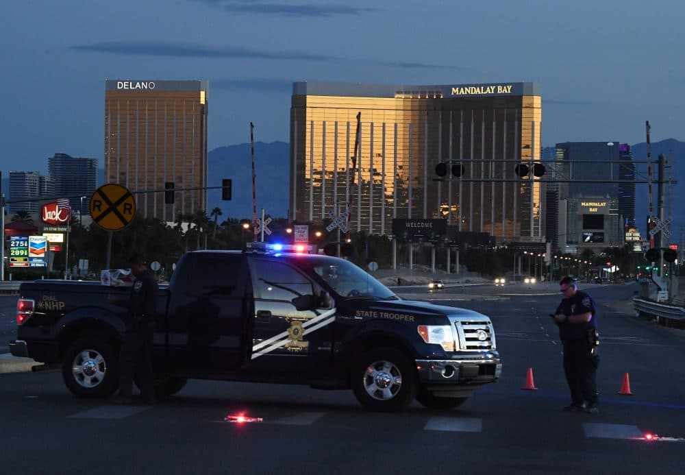 Police form a perimeter around the road leading to the Mandalay Hotel after a gunman killed at least 50 people and wounded more than 400 others when he opened fire on a country music concert in Las Vegas on Oct. 2, 2017. (Mark Ralston/AFP/Getty Images)