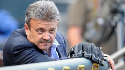 Former Dodgers GM Ned Colletti tells a story involving an owner, a starting pitcher and a couple beers. (Hannah Foslien/Getty Images)