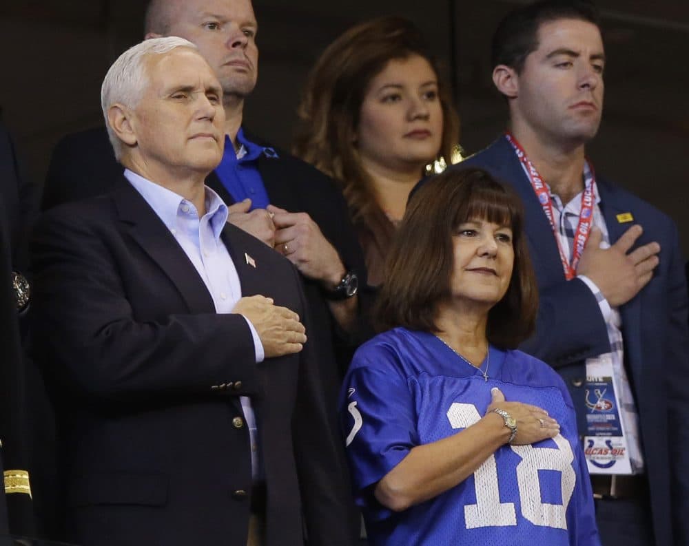Vice President Mike Pence and his wife, Karen, stand during the playing of the national anthem before an NFL football game between the Indianapolis Colts and the San Francisco 49ers, Sunday, Oct. 8, 2017, in Indianapolis. (Michael Conroy/AP)