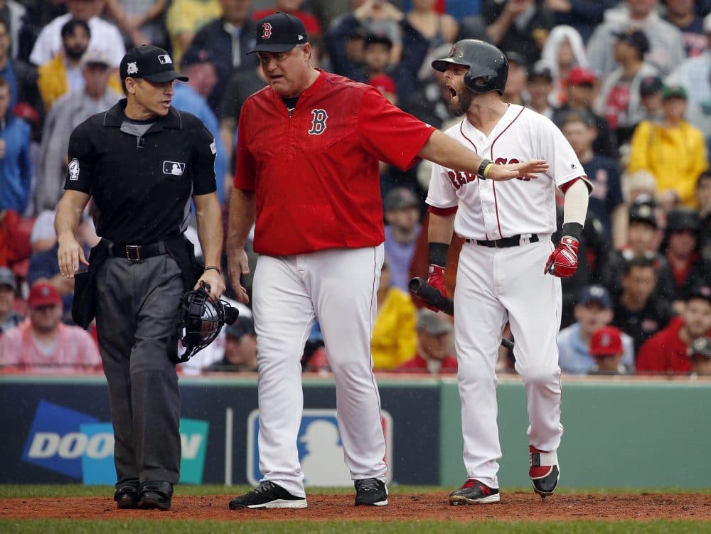 Red Sox manager John Farrell is ejected after defending Dustin Pedroia, who was called out on strikes in a Game 4 loss to the Houston Astros. (Michael Dwyer/AP)