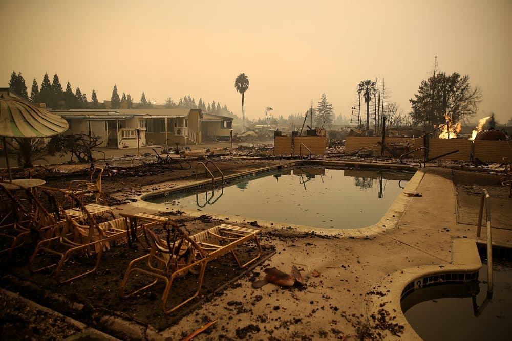 Burned pool chairs sit next to the swimming pool at the Journey's End Mobile Home Park on Oct. 9, 2017, in Santa Rosa, Calif. (Justin Sullivan/Getty Images)