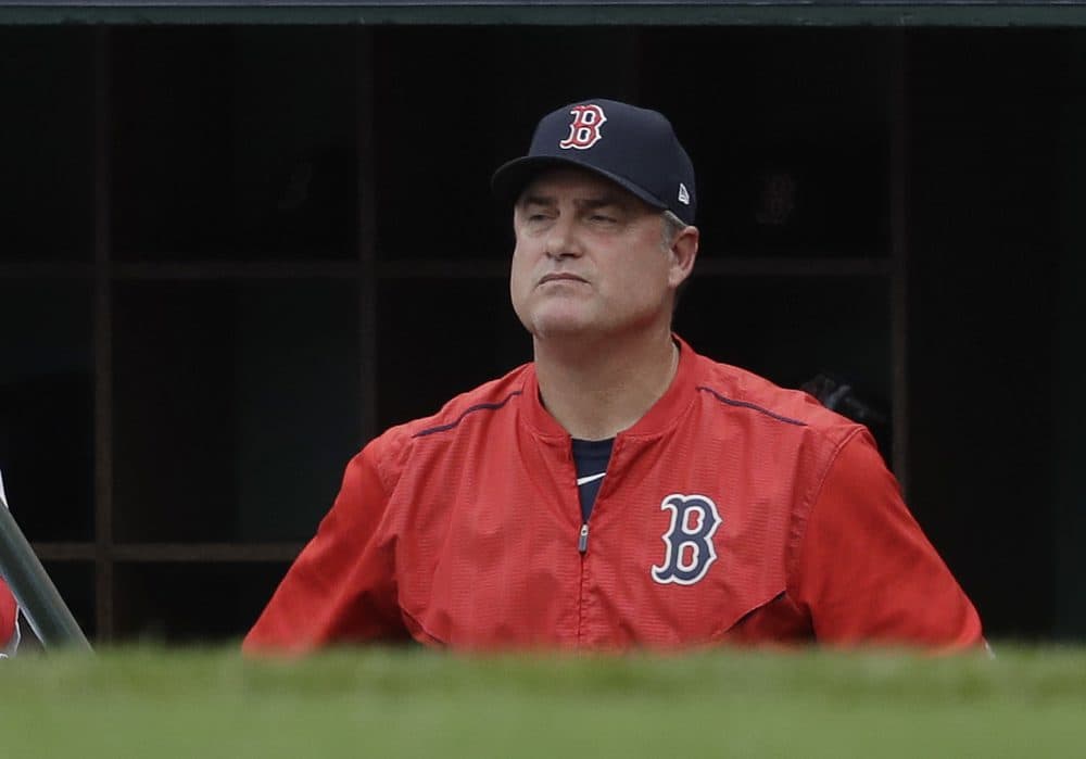 Boston Red Sox manager John Farrell watches from the dugout during the second inning in Game 3 of baseball's American League Division Series against the Houston Astros on Sunday. (Charles Krupa/AP)