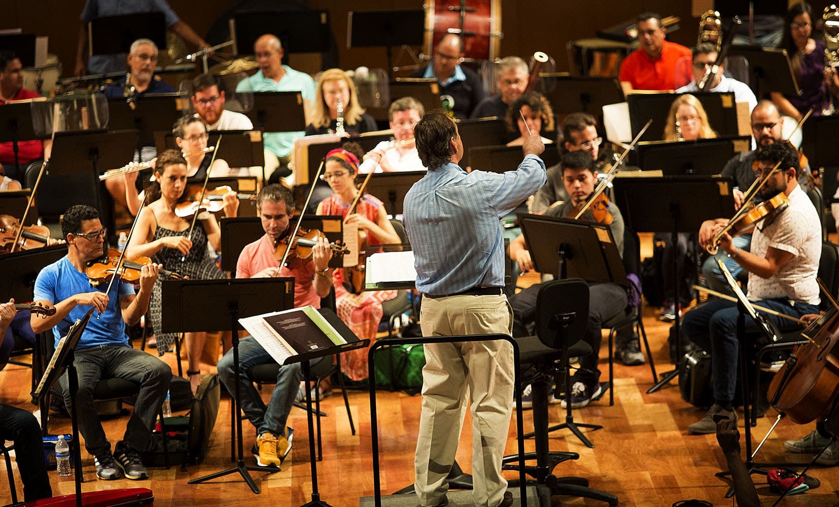 Maximiano Valdés, music director of the Puerto Rico Symphony Orchestra, conducts the symphony during a rehearsal. (Jesse Costa/WBUR)