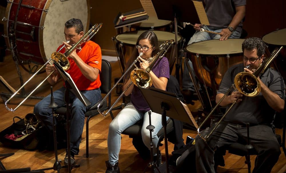 The trombone section of the Puerto Rico Symphony Orchestra during a rehearsal before a string of free concerts. (Jesse Costa/WBUR)