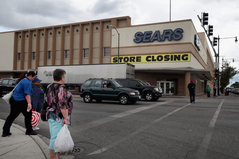A sign announcing the store will be closing hangs above a Sears store on Aug. 24, 2017 in Chicago. (Scott Olson/Getty Images)