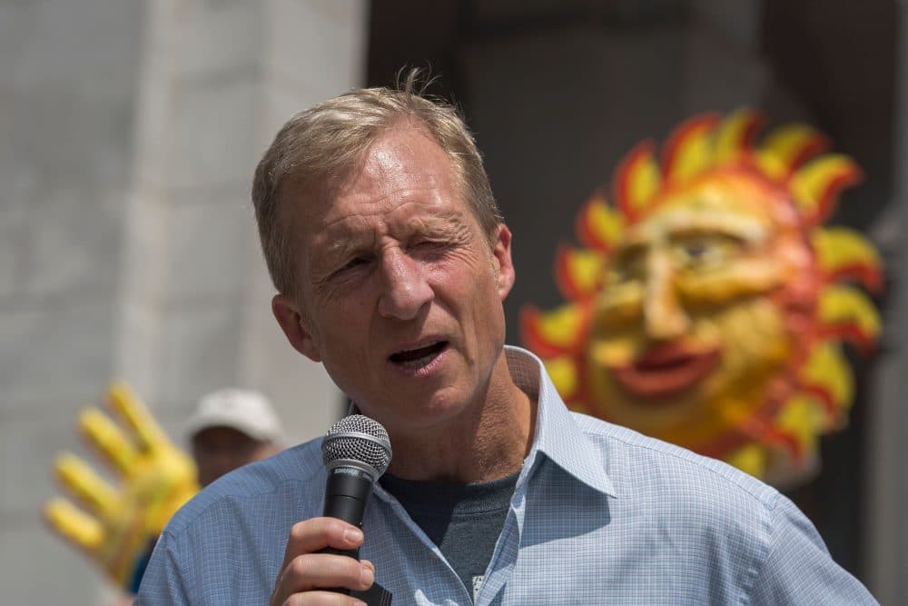 Billionaire environmental activist Tom Steyer, pictured here addressing the March to Break Free from Fossil Fuels in 2016 in Los Angeles, has launched an ad campaign seeking President Trump's impeachment. (David McNew/AFP/Getty Images)