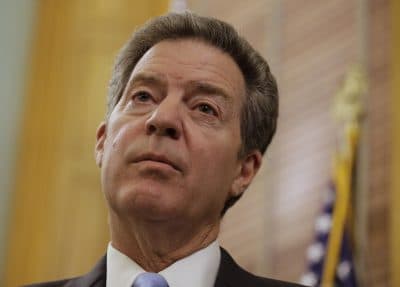 Kansas Gov. Sam Brownback talks with the media during a news conference Thursday, July 27, 2017, in Topeka, Kan. (Charlie Riedel/AP)