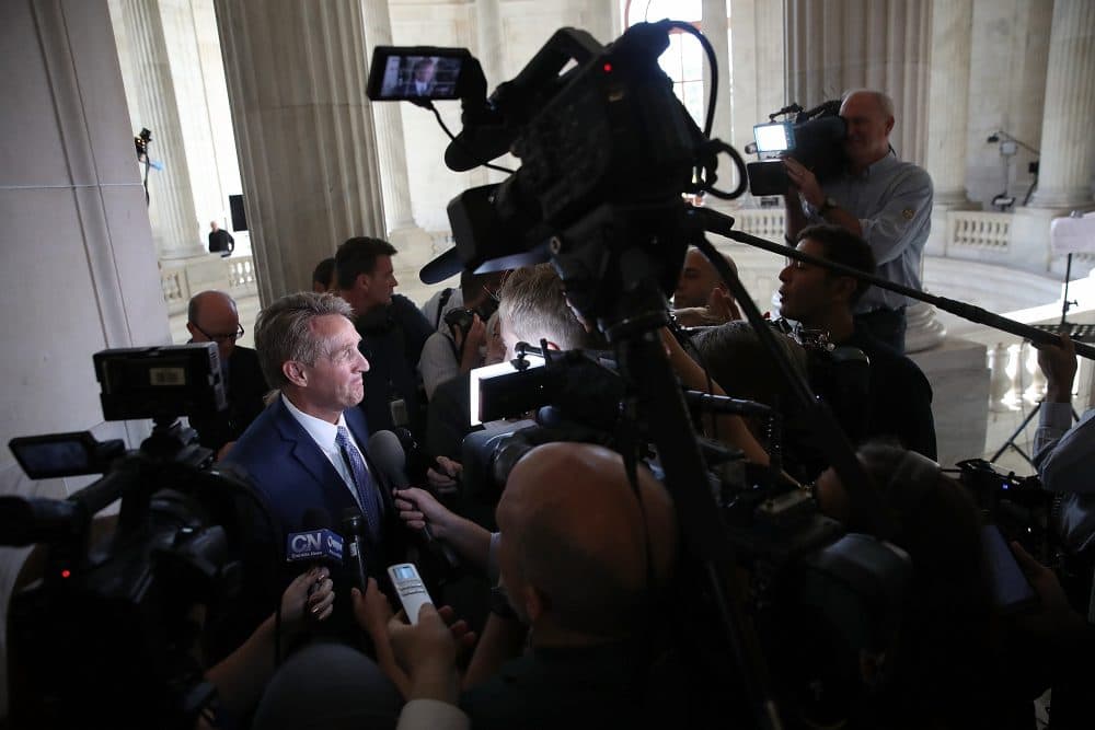 Sen. Jeff Flake, R-Ariz., speaks to reporters on Capitol Hill after announcing he will not seek re-election Oct. 24, 2017 in Washington. Flake announced that he will leave the Senate after his term ends in 14 months. (Win McNamee/Getty Images)