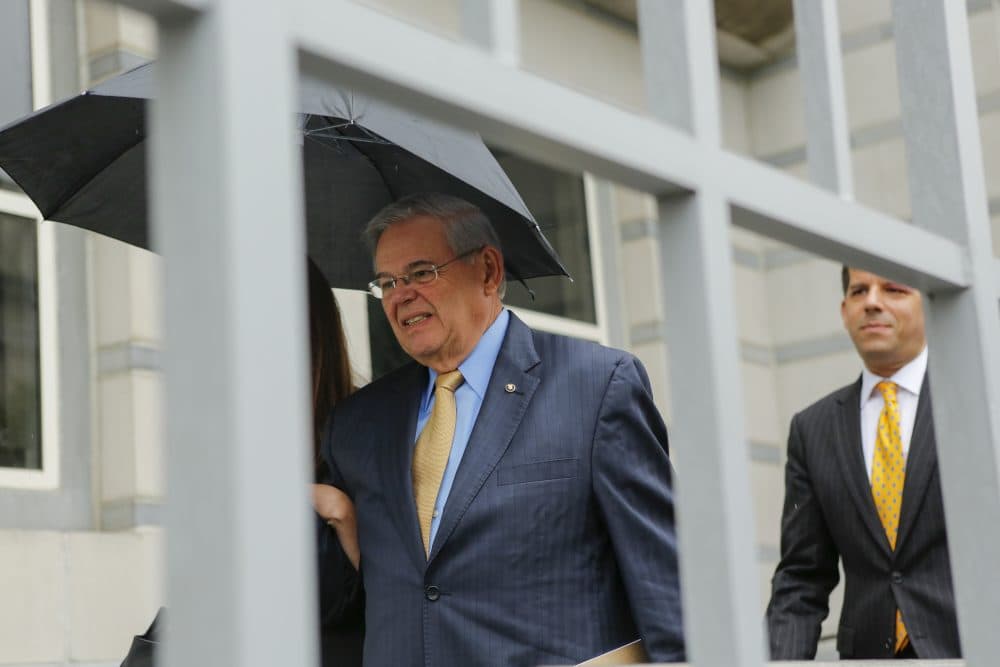 U.S. Sen. Robert Menendez, D-N.J. (left) exits federal court on the first day of his trial on corruption charges on Sept. 6, 2017 in Newark, N.J. (Eduardo Munoz Alvarez/Getty Images)