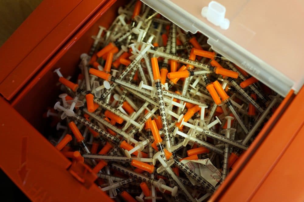 Used syringes are viewed at a needle exchange clinic where users can pick up new syringes and other clean items for those dependent on heroin on Feb. 6, 2014 in St. Johnsbury, Vt. (Spencer Platt/Getty Images)