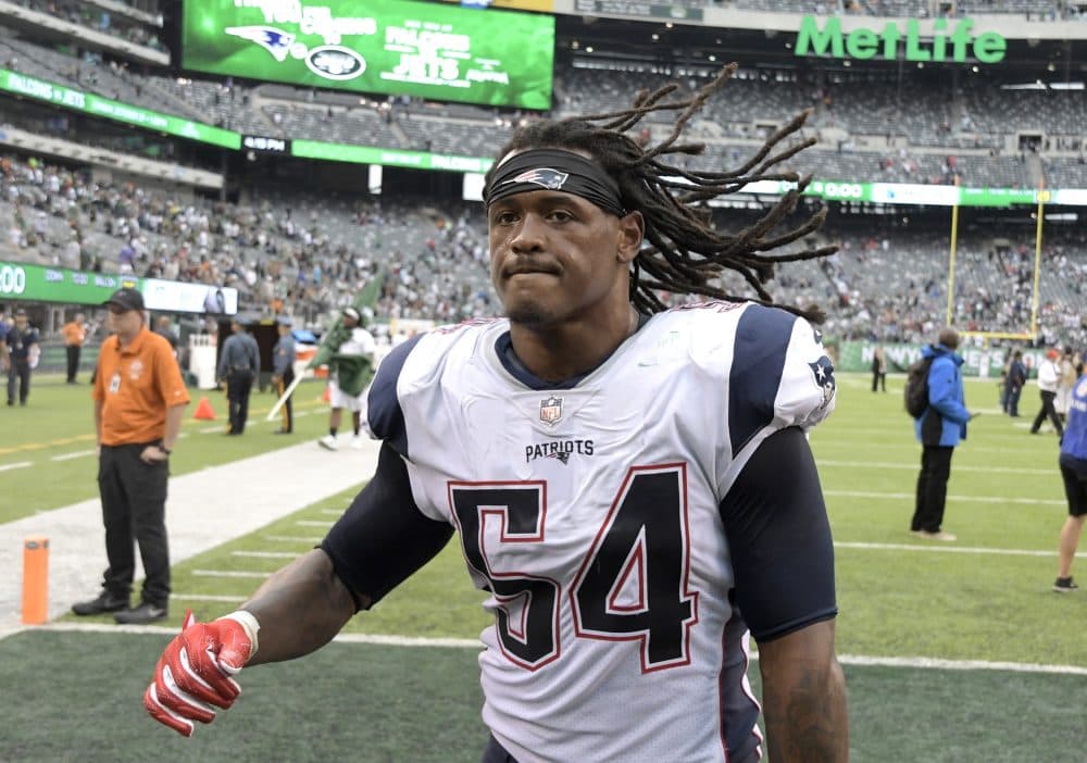 New England Patriots middle linebacker Dont'a Hightower (54) walks off the field after the Patriots defeated the New York Jets 24-17 in an NFL football game in East Rutherford, N.J. on Oct. 15. (Bill Kostroun/AP)