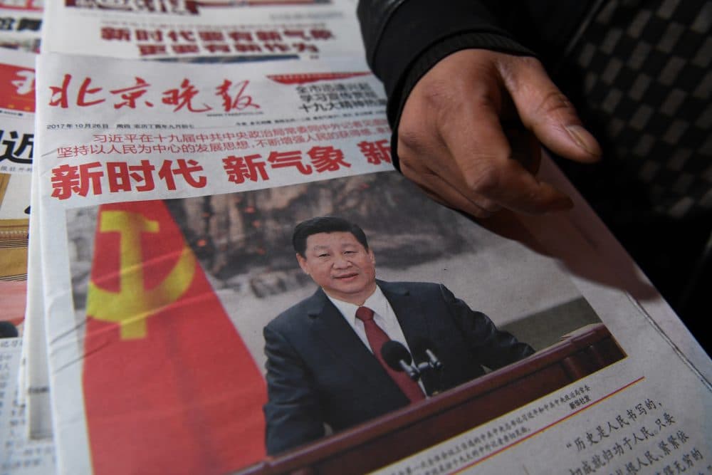 Newspapers featuring China's President Xi Jinping are pictured at a newsstand in Beijing on Oct. 26, 2017, a day after he was introduced at China's new Politburo Standing Committee, the nation's top decision making body. (Greg Baker/AFP/Getty Images)