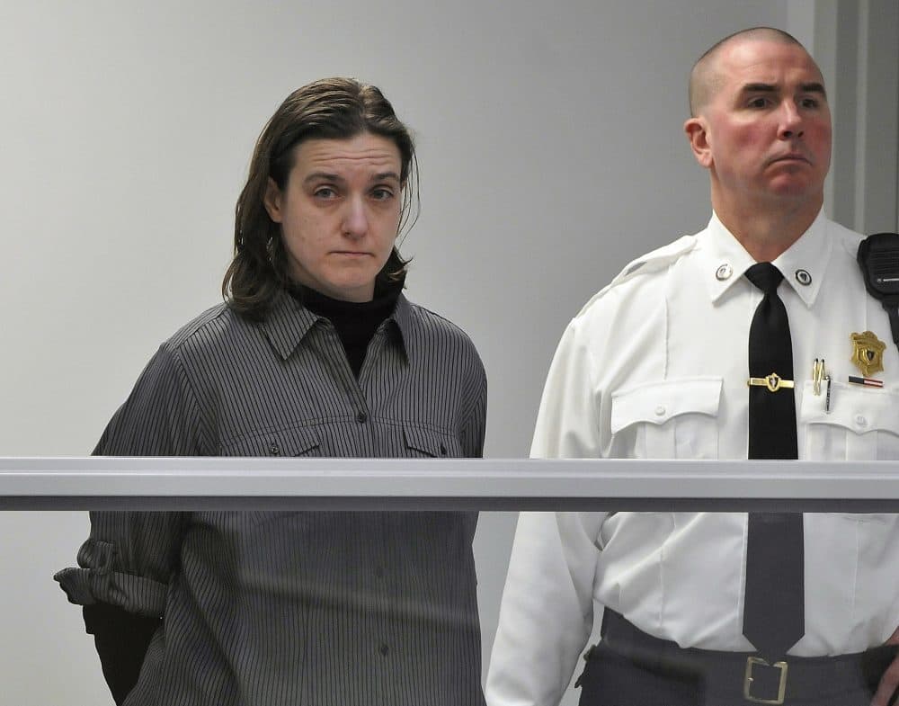 FILE - In this Jan. 22, 2013, file photo, Sonja Farak, left, stands during her arraignment at Eastern Hampshire District Court in Belchertown, Mass. Assistant Hampden County District Attorney Bethany Lynch said Tuesday, Oct. 31, 2017, in a Massachusetts Supreme Judicial Court hearing, that approximately 4,300 cases have been connected to evidence tested by Farak, who was convicted in 2014 of stealing drugs and tampering with evidence at the lab. Lynch said her office is deciding which cases it will agree to dismiss and which to retry. (Don Treeger/The Republican via AP, Pool, File)