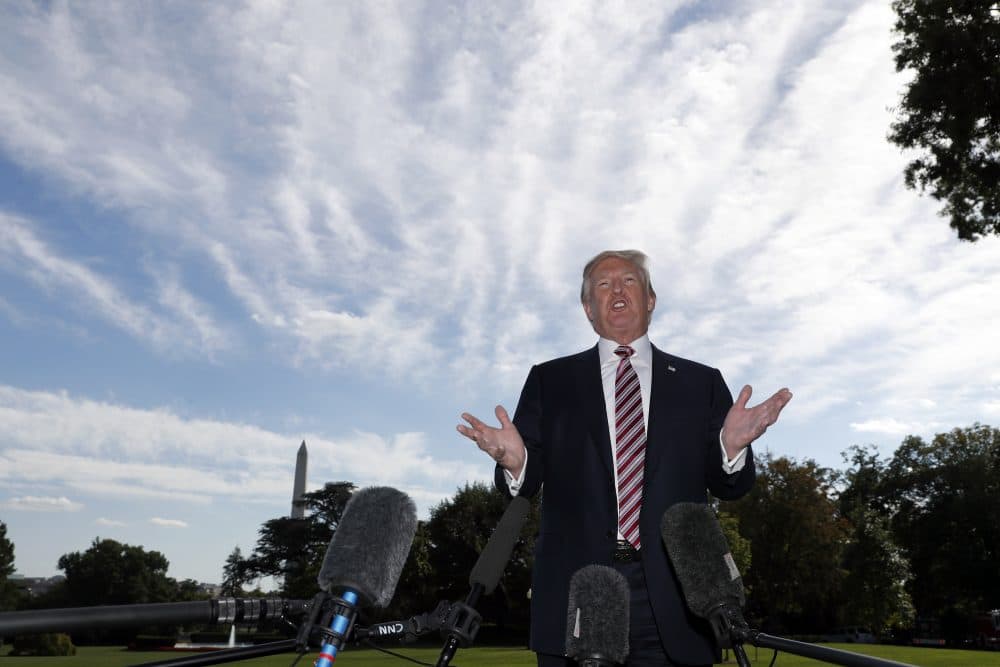 President Donald Trump speaks to the media as he walks to Marine One as he departs the White House, Friday, Sept. 29, 2017, in Washington. (Alex Brandon/AP)