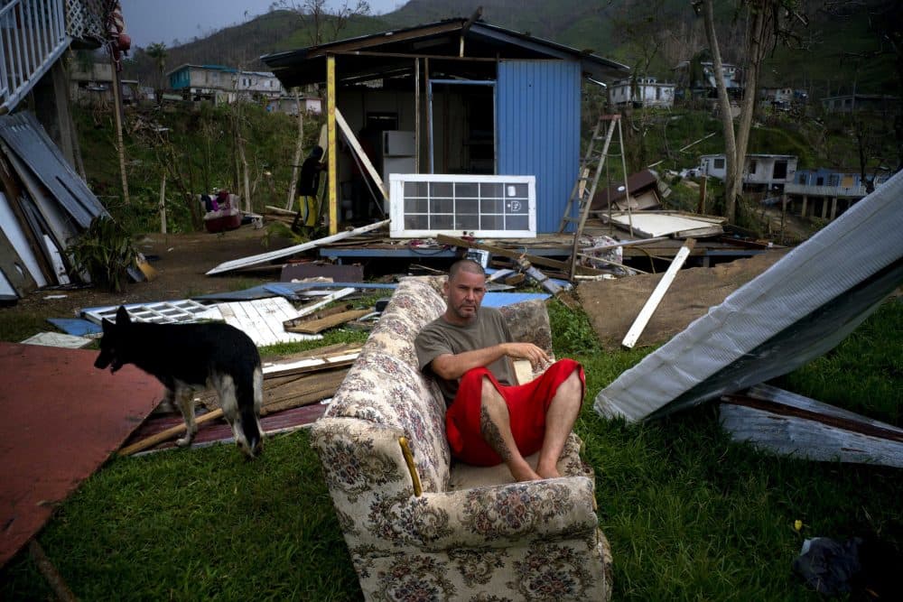 Angel Rodriguez poses next to his belongings in front of his house, destroyed by Hurricane Maria, in the San Lorenzo neighborhood of Morovis, Puerto Rico, Saturday, Sept. 30, 2017. Rodriguez said that it rained and rained. &quot;I was really afraid on the night of the hurricane. But the important thing is to be alive,&quot; he said. (Ramon Espinosa/AP)