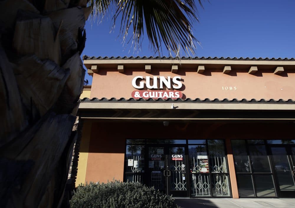 The Guns & Guitars store is shown in Mesquite, Nev., Monday, Oct. 2, 2017. The store's general manager Christopher Sullivan said in a statement Monday that Stephen Craig Paddock showed no signs of being unfit to buy guns. Paddock killed dozens and injured hundreds Sunday night when he opened fired at an outdoor country music festival in Las Vegas. (Chris Carlson/AP)