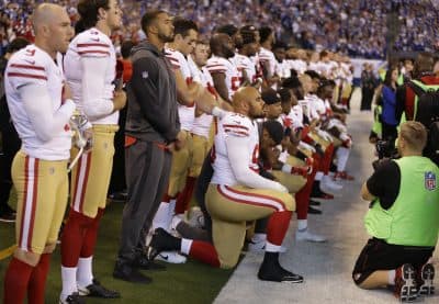 Members of the San Francisco 49ers kneel during the playing of the national anthem before an NFL football game against the Indianapolis Colts, Sunday, Oct. 8, 2017, in Indianapolis. Vice President Mike Pence left the 49ers-Colts game after about a dozen San Francisco players took a knee during the national anthem Sunday. (Michael Conroy/AP)
