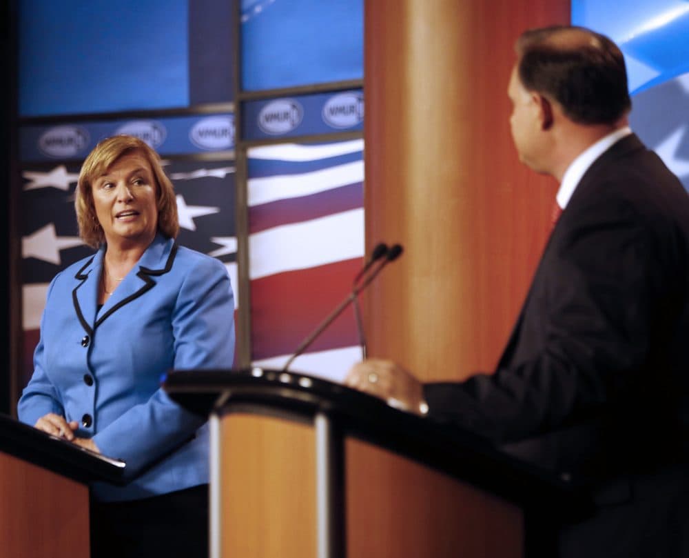 U.S. Rep. Carol Shea-Porter D-N.H., questions her opponent, former Republican U.S. Rep. Frank Guinta, during a 2014 debate. (Jim Cole/AP)