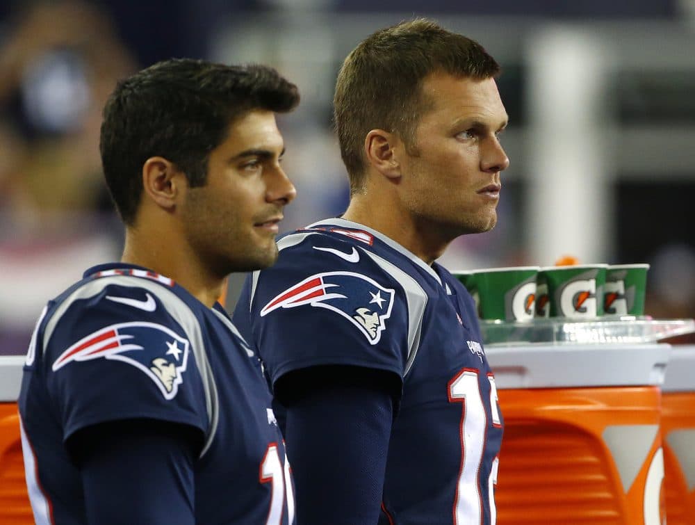 New England Patriots quarterback Tom Brady, right, and quarterback Jimmy Garoppolo look on during the second half of an NFL preseason football game against the New York Giants, Thursday, Aug. 31, 2017, in Foxborough, Mass. (AP Photo/Winslow Townson)