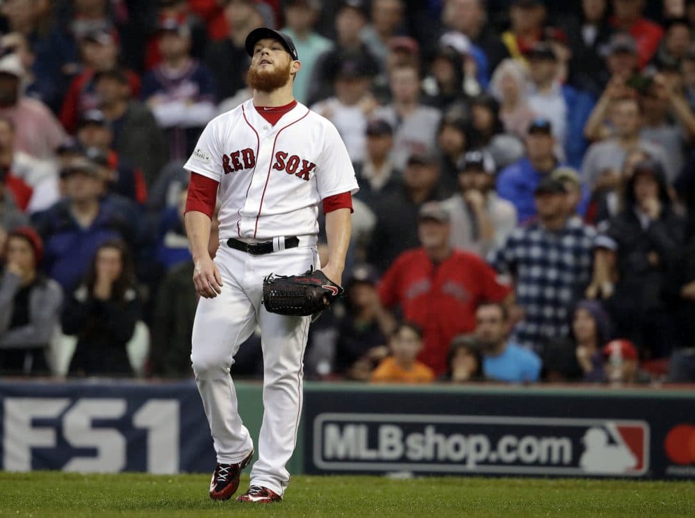 Boston Red Sox relief pitcher Craig Kimbrel reacts after giving up an RBI single to Houston Astros designated hitter Carlos Beltran during the ninth inning in Game 4 of baseball's American League Division Series, Monday, Oct. 9, 2017, in Boston. (AP Photo/Charles Krupa)
