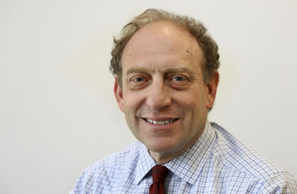 In this March 18, 2015 file photo, former Associated Press Vice President and Senior Managing Editor Mike Oreskes poses for a photo at AP headquarters, in New York. Oreskes, current vice president of news and editorial director at National Public Radio, has been placed on leave following a published report that he abruptly kissed two women who were seeking jobs while he was Washington bureau chief at The New York Times in the 1990s. (Chuck Zoeller/AP)