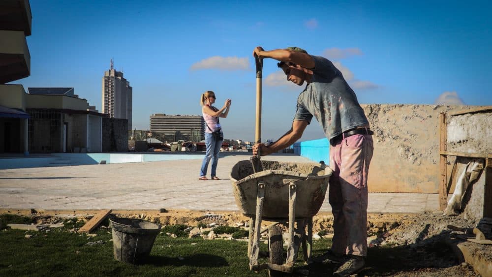 A laborer works at the Chateau Miramar Hotel in Havana on Oct. 16, 2017. Cuba's hotels have recovered from the damage caused by Hurricane Irma, which hit the northern coast of the island, where most of the beach hotels are located, just two months before the start of the high season. (Maylin Alonso/AFP/Getty Images)