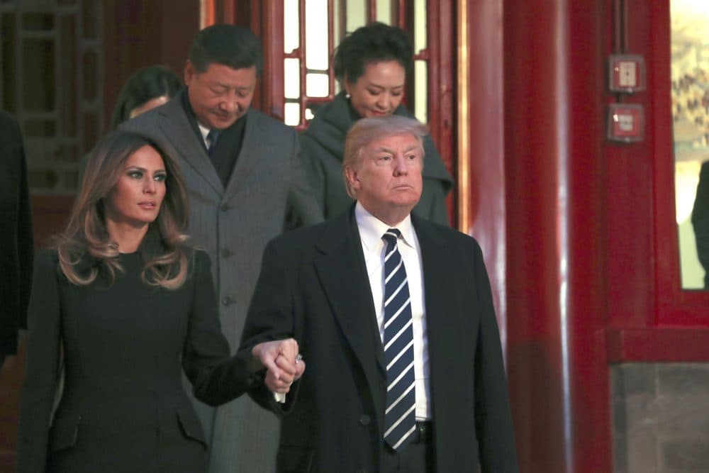 President Trump and first lady Melania Trump arrive with Chinese President Xi Jinping, left back, and Xi's wife Peng Liyuan, right back, to watch an opera performance at the Forbidden City, Wednesday, Nov. 8, 2017, in Beijing. (Andrew Harnik/AP)