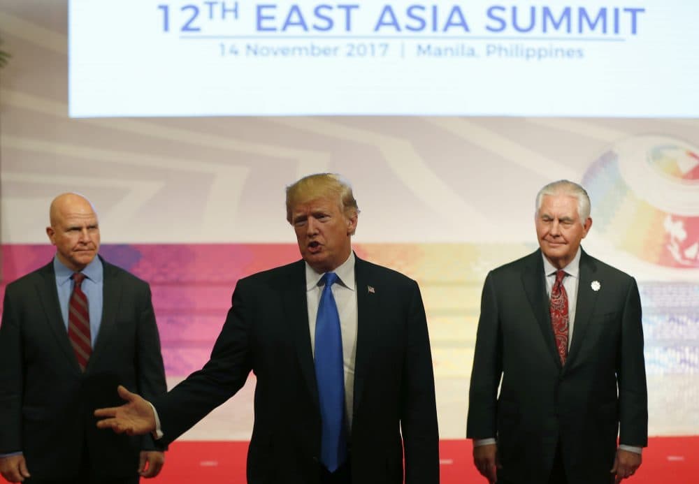 President Trump (center) gestures to the press as U.S. National Security Advisor H.R. McMaster (left) and U.S. Secretary of State Rex Tillerson look on after attending the 31st Association of Southeast Asian Nations (ASEAN) Summit in Manila on Nov. 14, 2017. (Bullit Marquez/AFP/Getty Images)