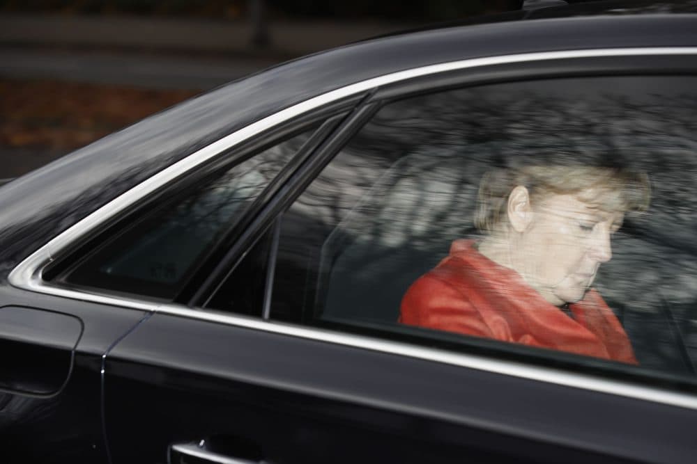 German Chancellor Angela Merkel leaves in her car from the presidential residence Bellevue Castle in Berlin, where she met the German president on Nov. 20, 2017 after coalition talks failed overnight. (Odd Andersen/AFP/Getty Images)