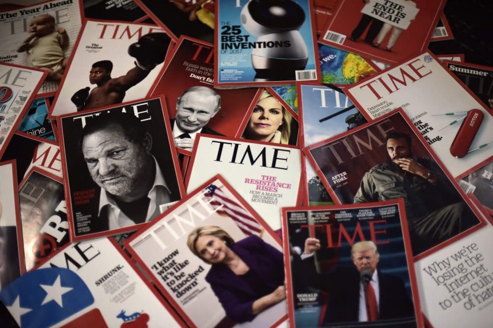 Time magazine copies are dispalyed on a table in Washgington on Nov. 27, 2017. Time Inc. is selling for $2.8 billion to media conglomerate Meredith Corporation, which is backed by the billionaire Koch brothers, who are known for supporting conservative causes. Time, which also publishes its eponymous magazine, Fortune and Sports Illustrated, began looking for a buyer late last year before giving up several months later, while welcoming options. (Eric Baradat/AFP/Getty Images)