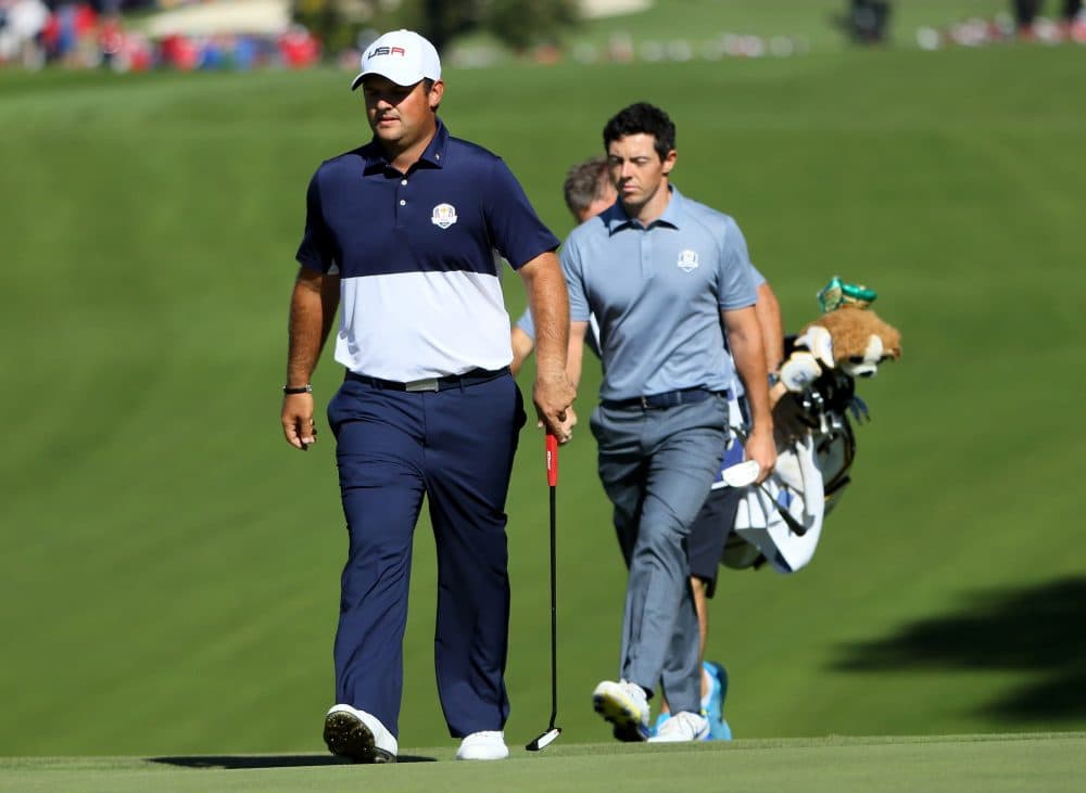 The Ryder Cup had a climactic conclusion in 2016 as Patrick Reed (left) of the U.S. matched Rory McIlroy of Europe birdie for birdie to win the competition. (Andrew Redington/Getty Images)