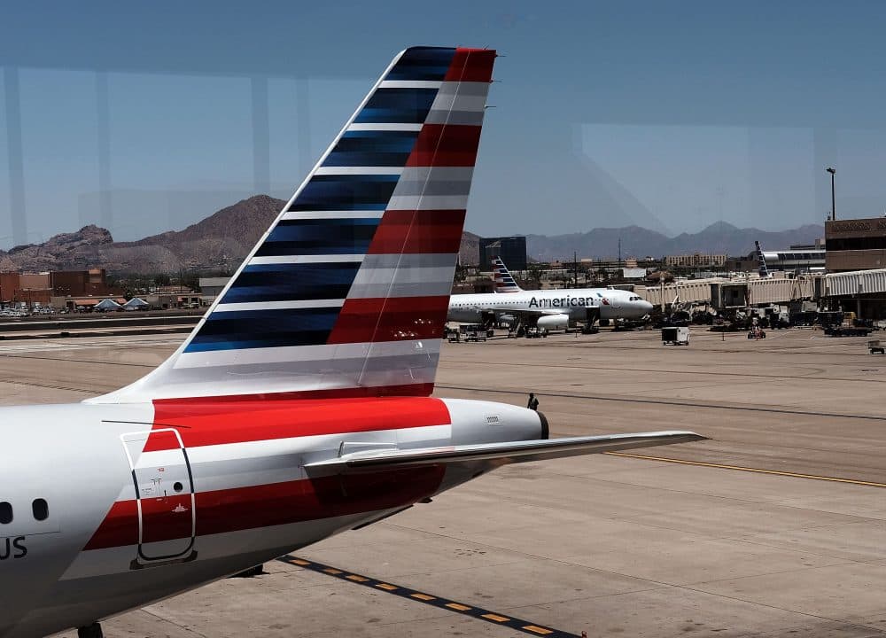The tail of an American Airlines aircraft sits on a runway on May 24, 2016. (Spencer Platt/Getty Images)