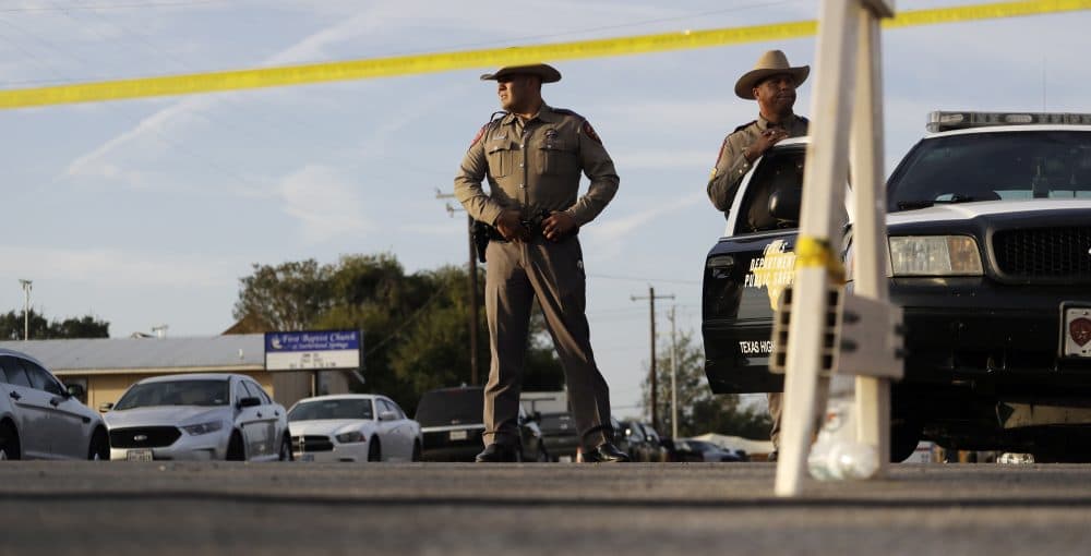 Law enforcement officials work the scene of a shooting at the First Baptist Church of Sutherland Springs, Monday, Nov. 6, 2017, in Sutherland Springs, Texas. A man opened fire inside the church in the small South Texas community on Sunday, killing more than 20 and wounding others. (AP Photo/Eric Gay)