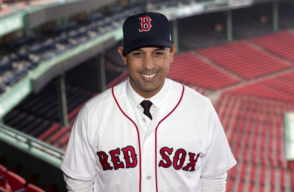 Boston Red Sox manager Alex Cora poses in Fenway Park following an introductory news conference. (Michael Dwyer/AP)