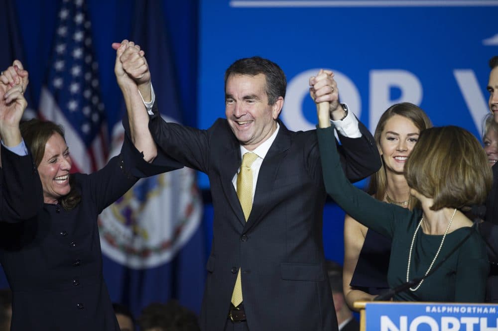 Virginia Gov.-elect Ralph Northam celebrates his election victory with his wife Pam and daughter Aubrey, right, and Dorothy McAuliffe, wife of Virginia Gov. Terry McAuliffe at the Northam For Governor election night party at George Mason University in Fairfax, Va., Tuesday, Nov. 7, 2017. (Cliff Owen/AP)