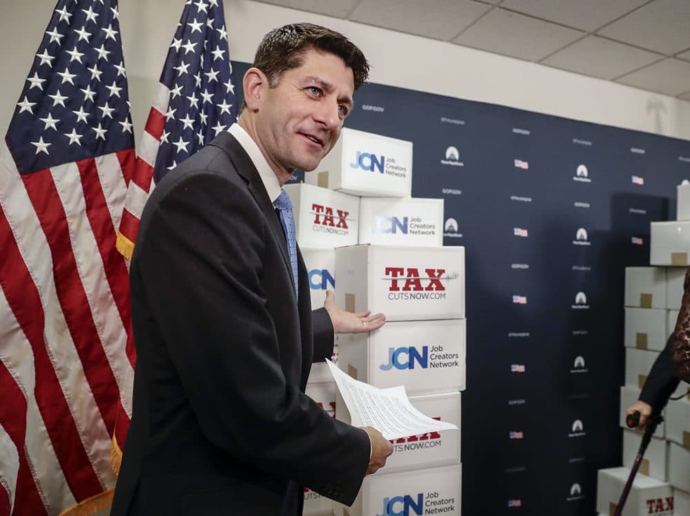 Speaker of the House Paul Ryan, R-Wis., points to boxes of petitions supporting the Republican tax bill at a news conference on Capitol Hill in Washington, Tuesday, Nov. 14, 2017. (J. Scott Applewhite/AP)