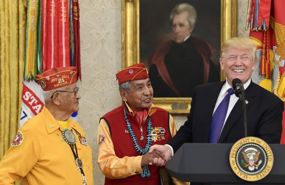 President Trump meets with Navajo code talkers Peter MacDonald, center, and Thomas Begay in the Oval Office Monday. (Susan Walsh/AP)