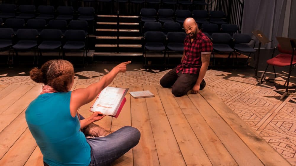 Actors Miranda Adekoje and Cliff Odle rehearse. (Courtesy Front Porch Arts Collective)