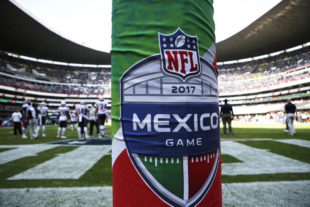 The logo for the NFL's Mexico Game is displayed on a goal post pad during warmups before an NFL football game between the Oakland Raiders and the New England Patriots, Sunday, Nov. 19, 2017, in Mexico City. (AP Photo/Rebecca Blackwell)