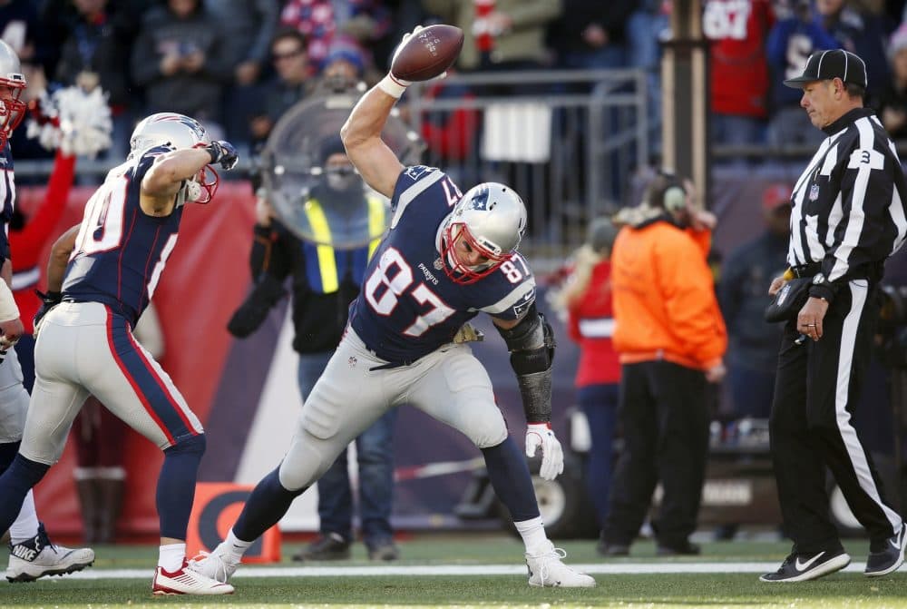 New England Patriots tight end Rob Gronkowski (87) spikes the ball after scoring a touchdown during the first half of an NFL football game against the Miami Dolphins, Sunday, Nov. 26, 2017, in Foxborough, Mass. (AP Photo/Michael Dwyer)