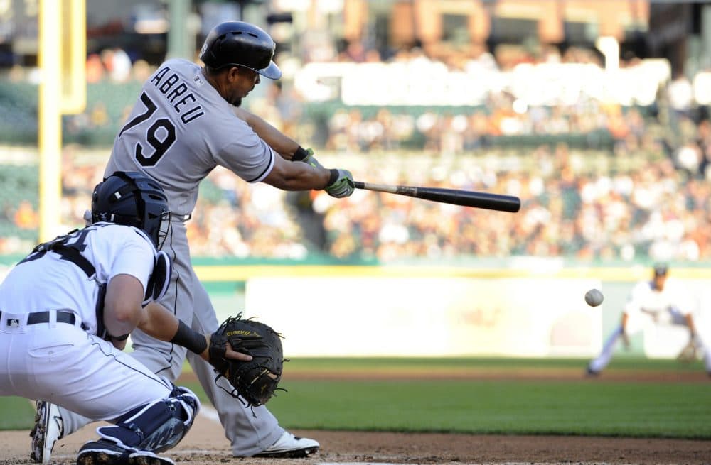 Chicago White Sox's Jose Abreu (79) hits an RBI single against the Detroit Tigers in the second inning of a baseball game, Saturday, Sept. 16, 2017, in Detroit. (AP Photo/Jose Juarez)