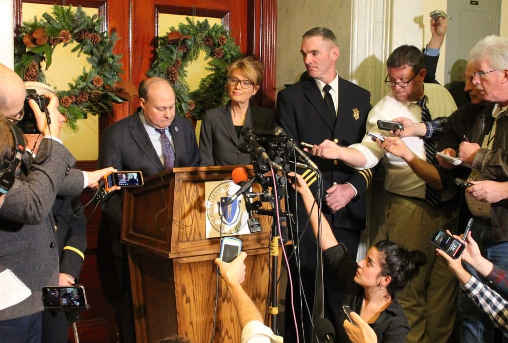 Senate President Stanley Rosenberg was flanked by an aide and court officers, and surrounded by media, during a press conference Friday about his husband's alleged sexual assaults and interference in Senate affairs. (Sam Doran/SHNS)