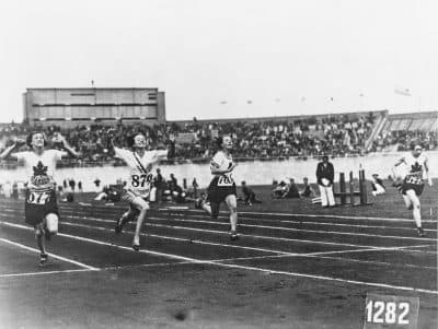 The 1928 Amsterdam Olympic Games were the first to include track and field events for women. Betty Robinson (second from left) took home a gold medal in the 100-meter. (Central Press/Hulton Archive/Getty Images)