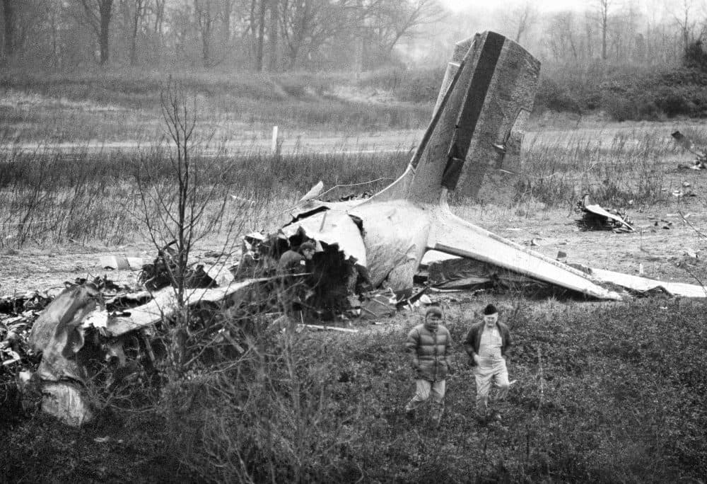 Wreckage of a DC-3 which crashed on takeoff from Dress Regional Airport in Evansville, Ind., lies on top of a ridge adjoining railroad tracks, Dec. 14, 1977. Twenty-nine people died in the crash, including the University of Evansville basketball team. (AP Photo)